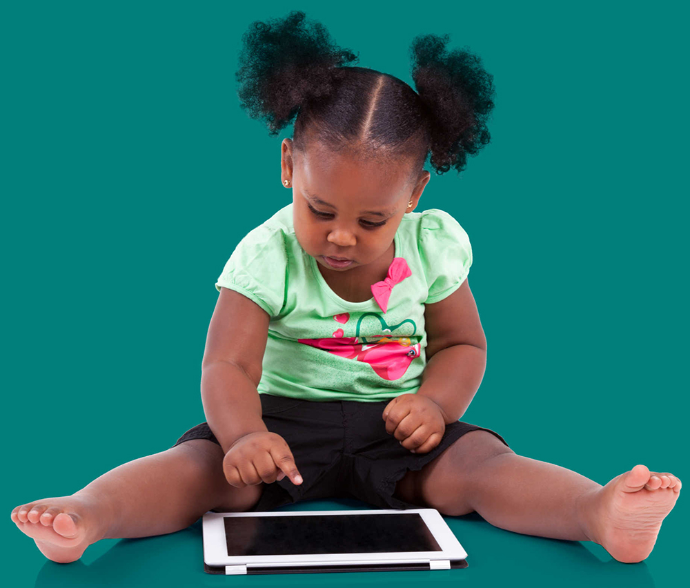 Young girl using a tablet device